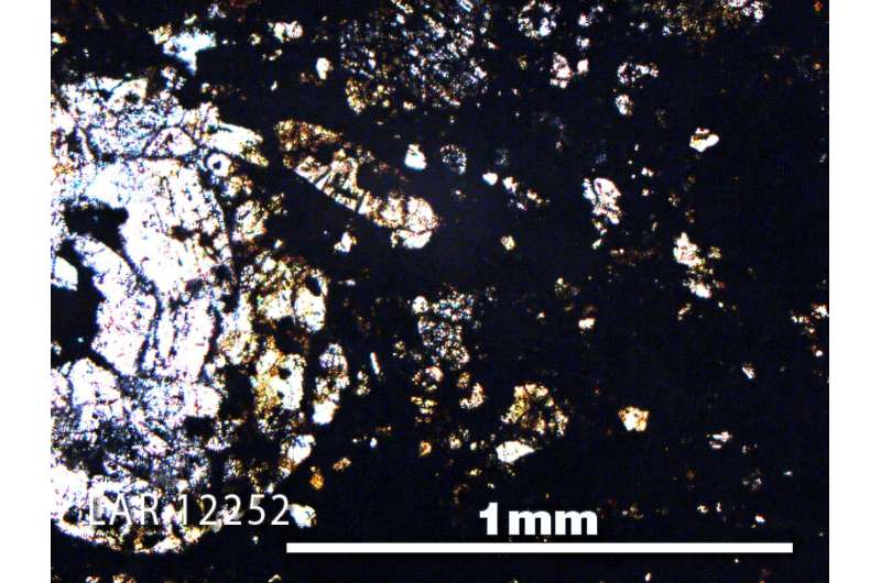 Thin section photo of sample LAR 12252 in plane-polarized light with 5x magnification. Credit: NASA. Scientists find evidence that overturns theories of the origin of water on Earth