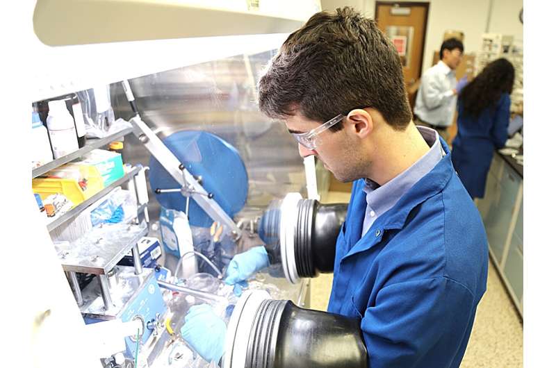Texas Engineer Stephen Fuller works on a battery. Credit: The University of Texas at Austin Smoothing over rough edges in batteries