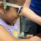 Engineering Hearts: Innovative Students Design a Custom Device to Empower a Courageous Kindergartner with Limb Difference