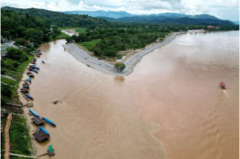 The Ruak River meets the Mekong River (R) in the Golden Triangle. The Ruak River meets the Mekong River (R) in the Golden Triangle