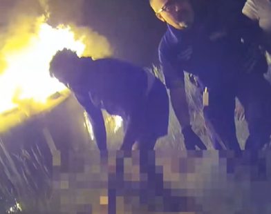 Heroic Rescue: Officer Bravely Shatters Flames to Save 68-Year-Old Woman Trapped in Burning Car