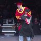 Joyful Triumph: Student Spins University President in Celebration of Achievement at Graduation Ceremony