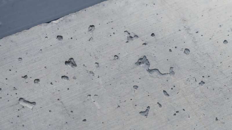 Cement, when combined with water, sand, and gravel, turns into concrete—the most commonly used construction material worldwide. However, cement production is a significant source of carbon dioxide emissions. Researchers at PSI are utilizing artificial intelligence and computer modeling to create more eco-friendly alternatives. Credit: Paul Scherrer Institute PSI/Markus Fischer AI paves the way toward green cement