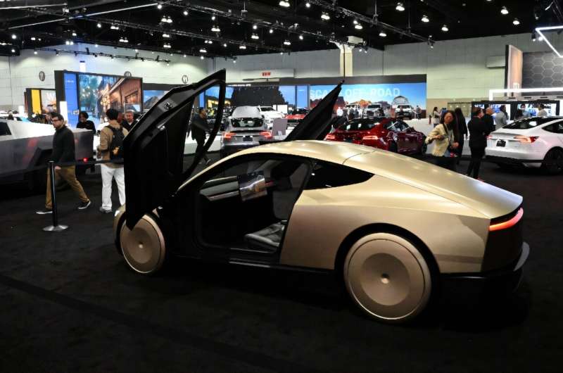 Tesla's Cybercab robotaxi was showcased at the AutoMobility LA 2024 auto show and is expected to launch production in 2026. Tesla's Cybercab robotaxi was showcased at the AutoMobility LA 2024 auto show and is expected to launch production in 2026.