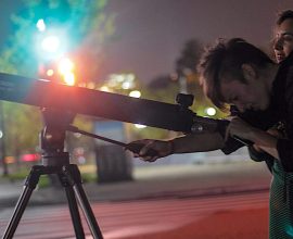 Unlock the Cosmos: Discover the Stars Right on Your Sidewalk with Free Pop-Up Telescopes!