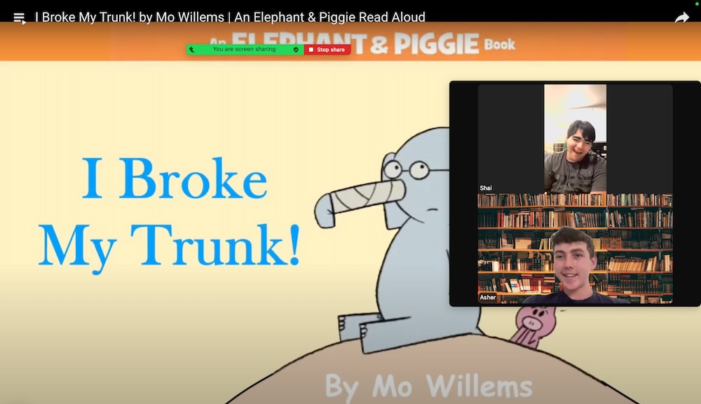 Asher and kids during a reading session