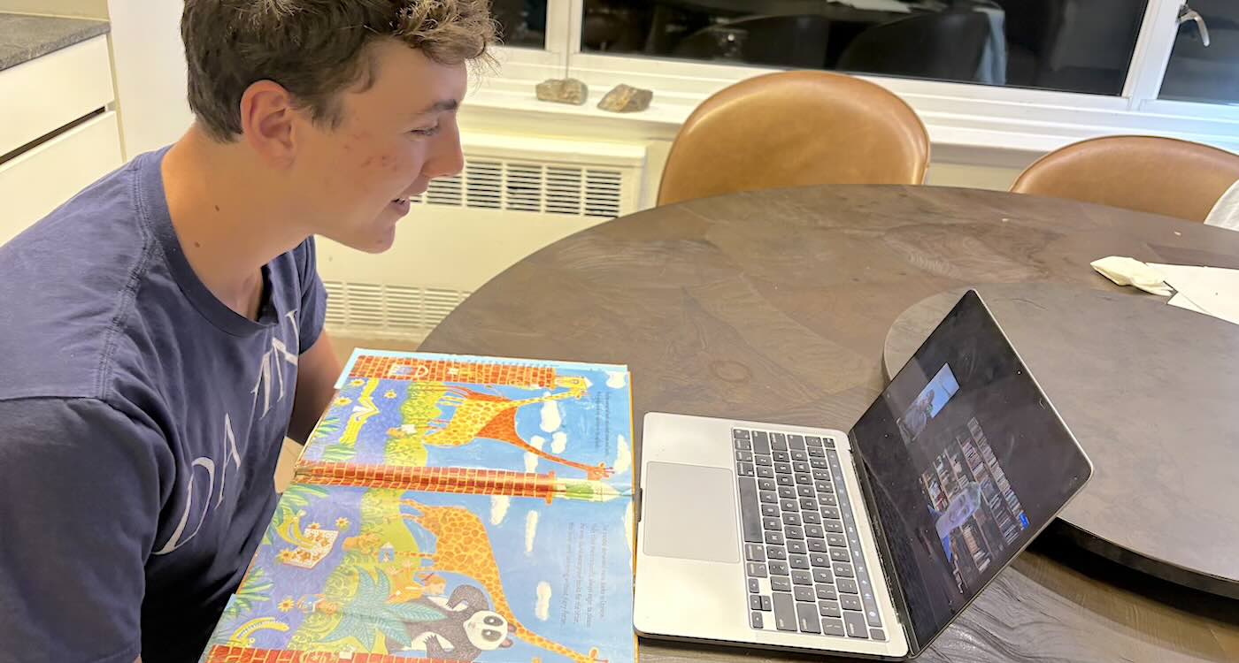Asher reading to special needs kids