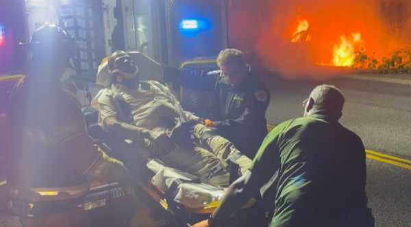 Heroic Father-Son Duo: Army Football Player and Dad's Daring Rescue Saves Driver from Fiery Fate!