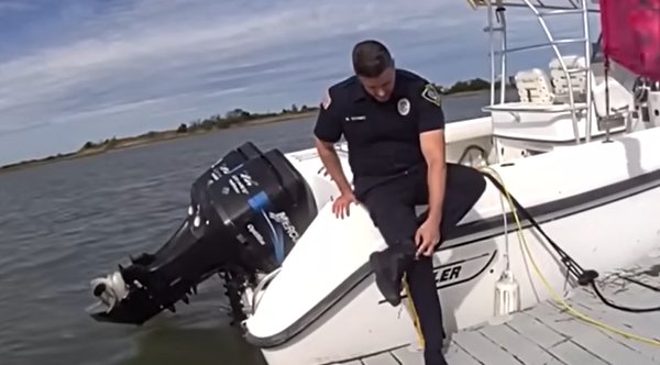 Bravery in the Flow: Officer's Heartwarming 100-Yard Swim to Save Injured Dog